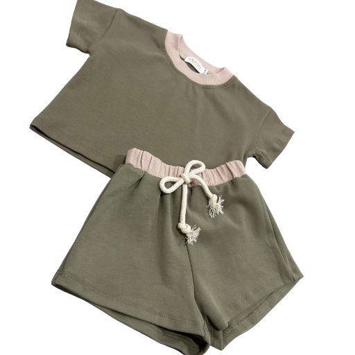 Organic dusty sage green cotton baby top and shorts set with blush pink trim and drawstring.