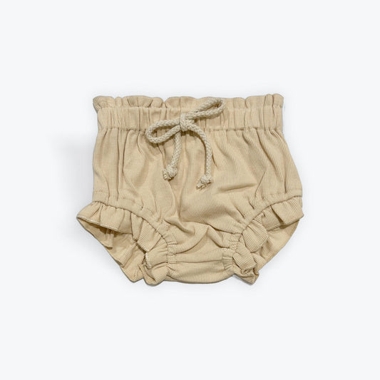 Beige organic cotton baby bloomer with elastic waist and tie, certified organic baby clothing.