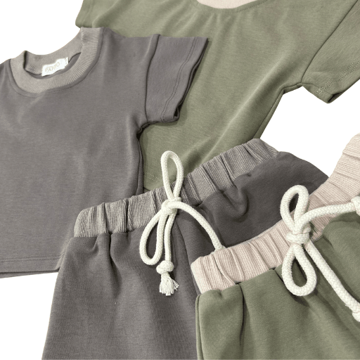 Soft organic baby clothes set with drawstring pants and short sleeves in muted tones