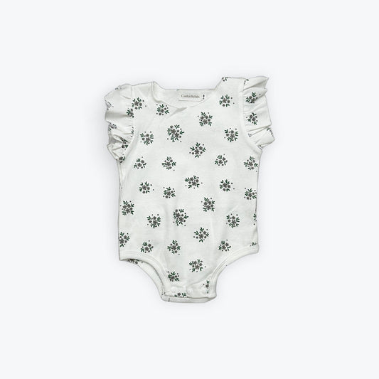 White organic baby bodysuit with green floral print and ruffled sleeves, certified organic by Casita Bebes.