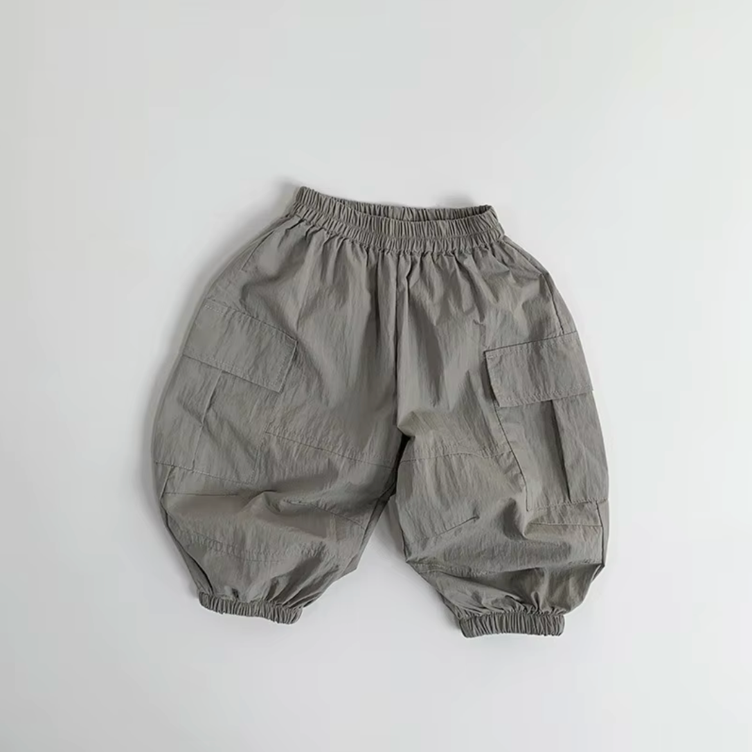 Organic dusty khaki baby pants with elastic waist and cuffs from Casita Bebes.