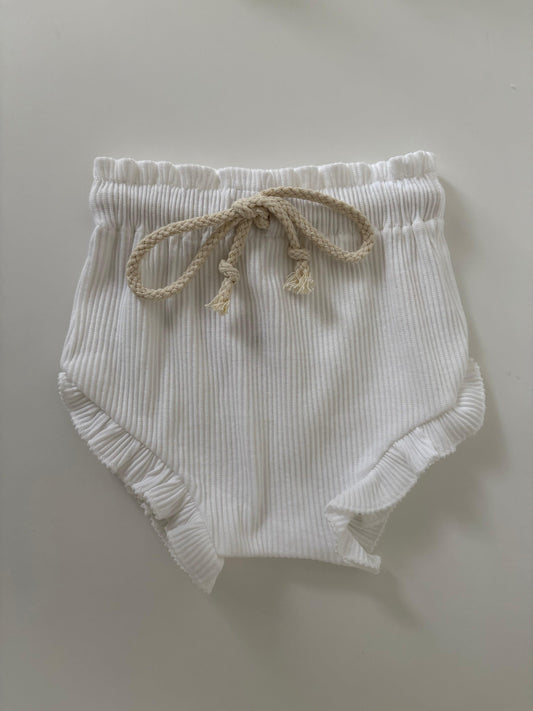 White ribbed baby bloomers with braided drawstring and ruffled hem