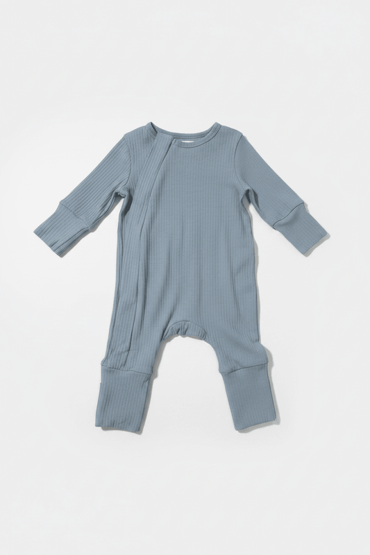 Blue baby onesie on a white background