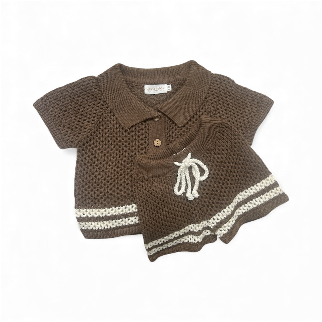 Brown knitted top and shorts with white trim  on a white background