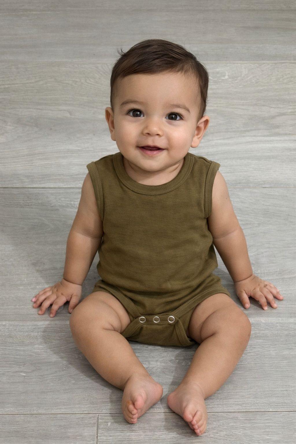 Organic olive green sleeveless baby bodysuit on smiling infant, certified organic baby clothing.
