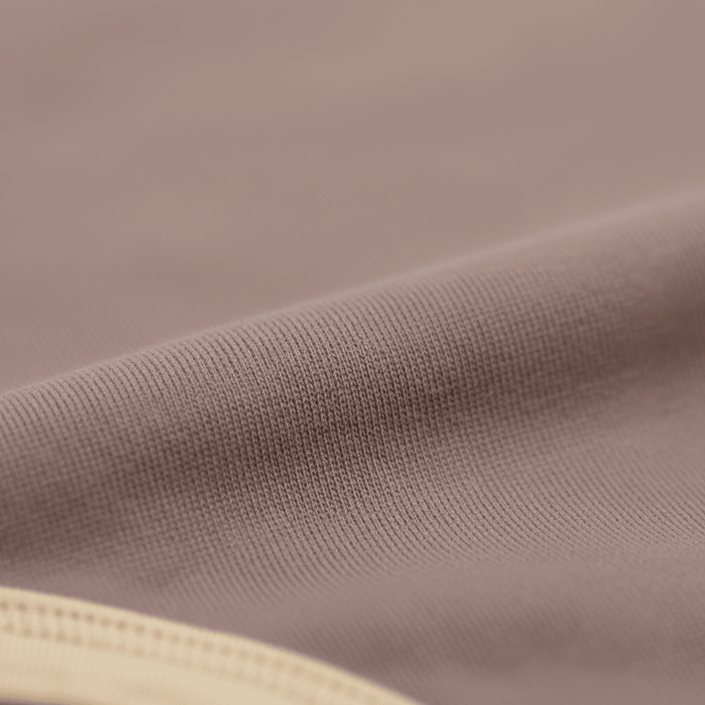 Soft organic cotton baby clothing fabric with gentle ribbed texture