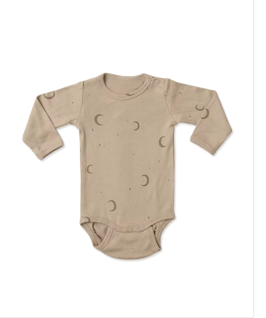 Dusty beige organic cotton baby bodysuit with crescent moon print, long sleeves, snap closures.