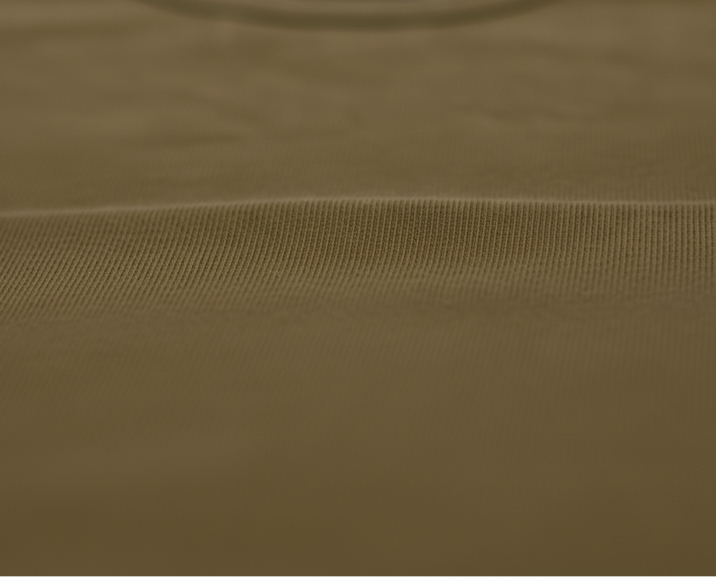 Close-up of brown organic bamboo fabric for baby clothing.