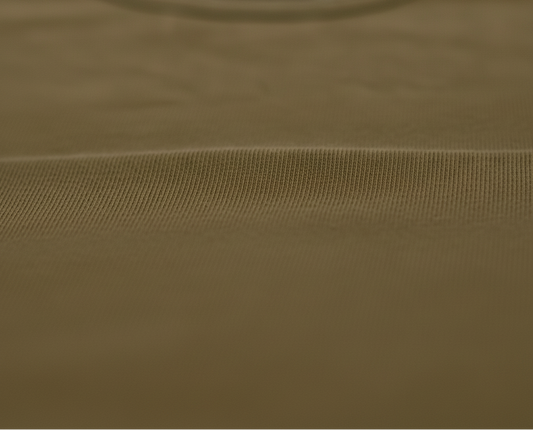 Close-up of brown organic bamboo fabric for baby clothing.