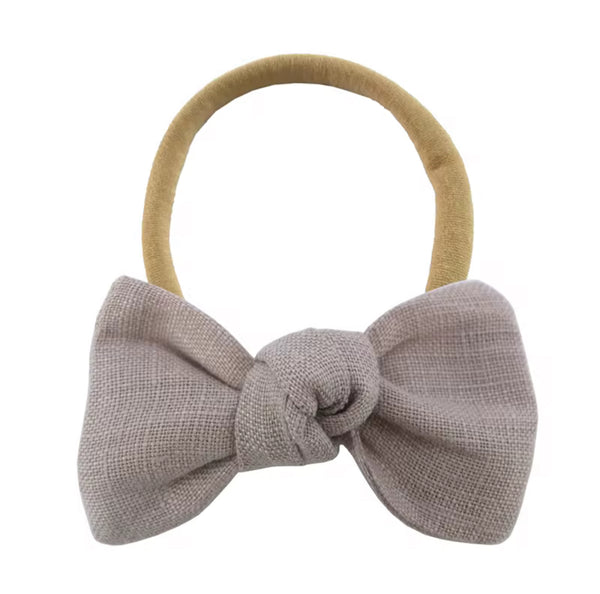 Newborn dusty dark Biege head and on a white background