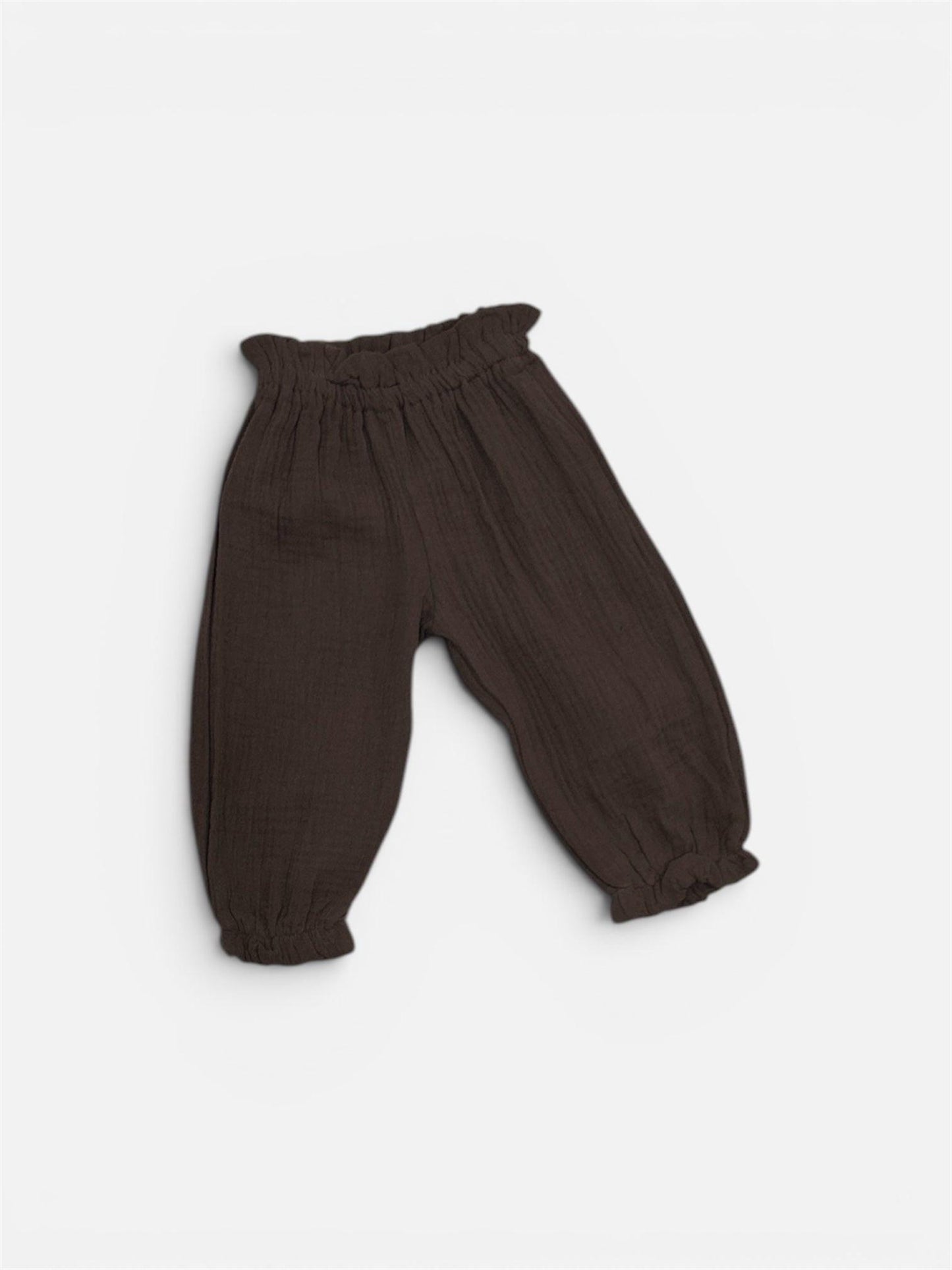 Brown organic cotton bubble pants for babies with gathered elastic waist and ankles.