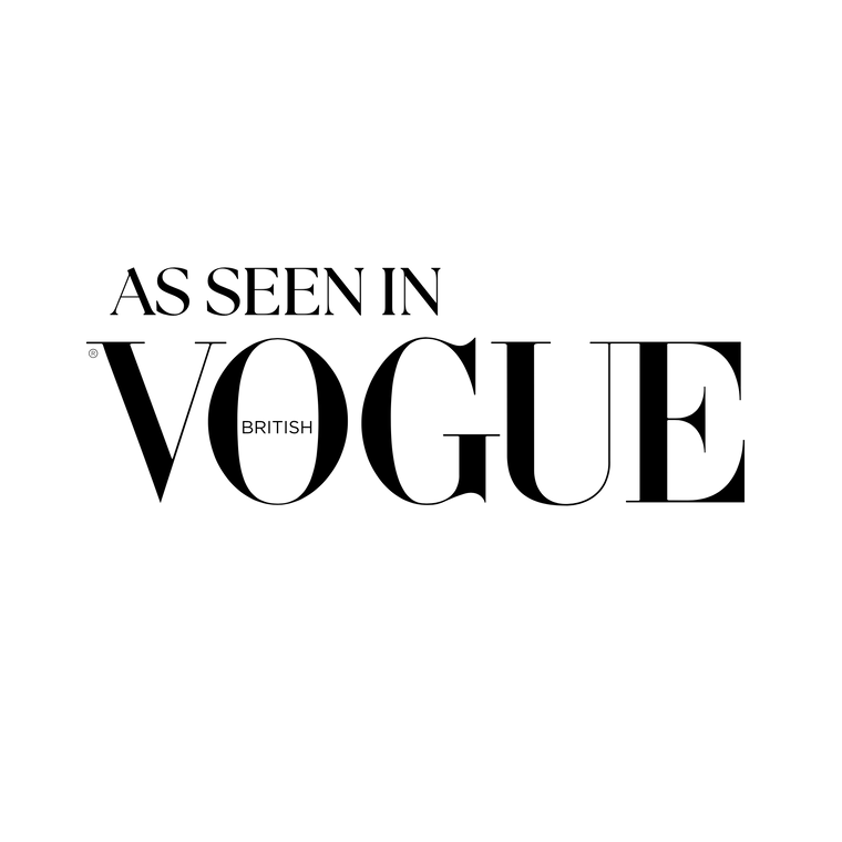 Black 'AS SEEN IN VOGUE BRITISH' logo text on a plain white background.