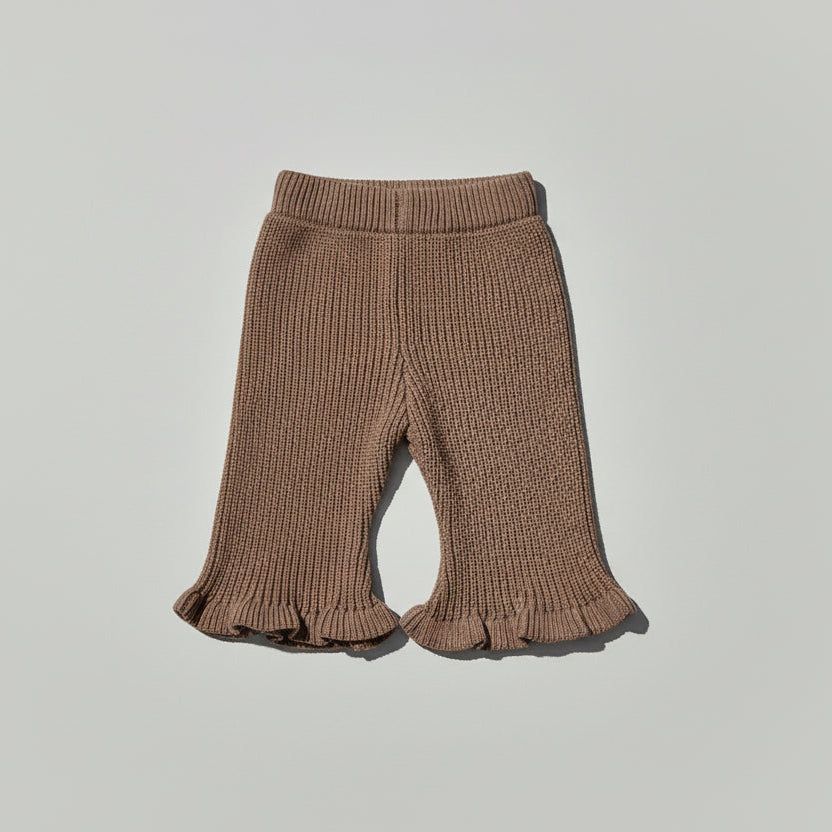Brown ribbed Flared knit baby girl pants with ruffled cuffs on a lwhite background brand Casita Bebès