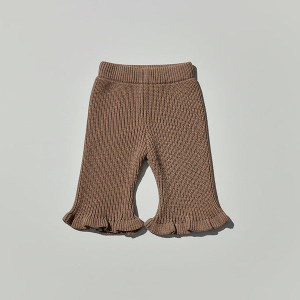 Brown ribbed Flared knit baby girl pants with ruffled cuffs on a lwhite background brand Casita Bebès