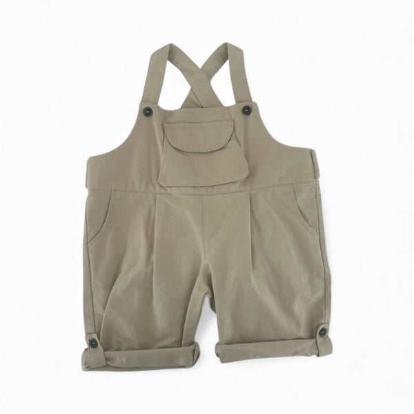 Khaki overalls with suspenders on a white background