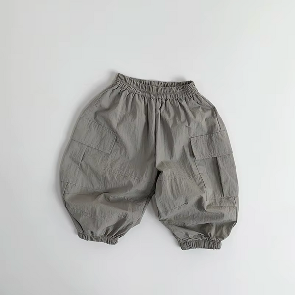 Gray cargo-style pants Casita Bebes Brand on a light gray background
