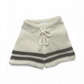 Organic knit baby shorts with drawstring waist and brown stripes, soft and breathable for everyday wear.