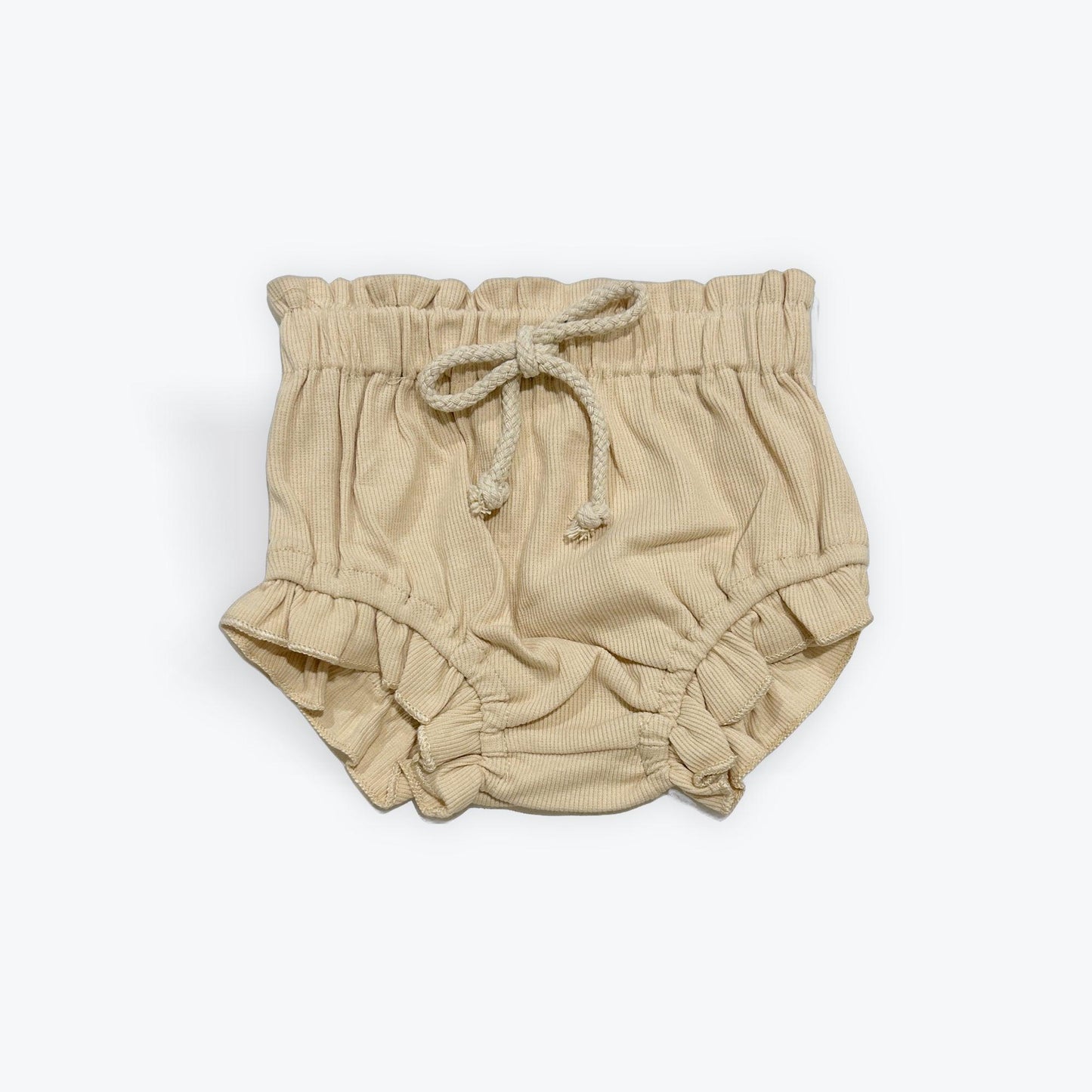 Beige organic cotton baby bloomer with elastic waist and tie, certified organic baby clothing.