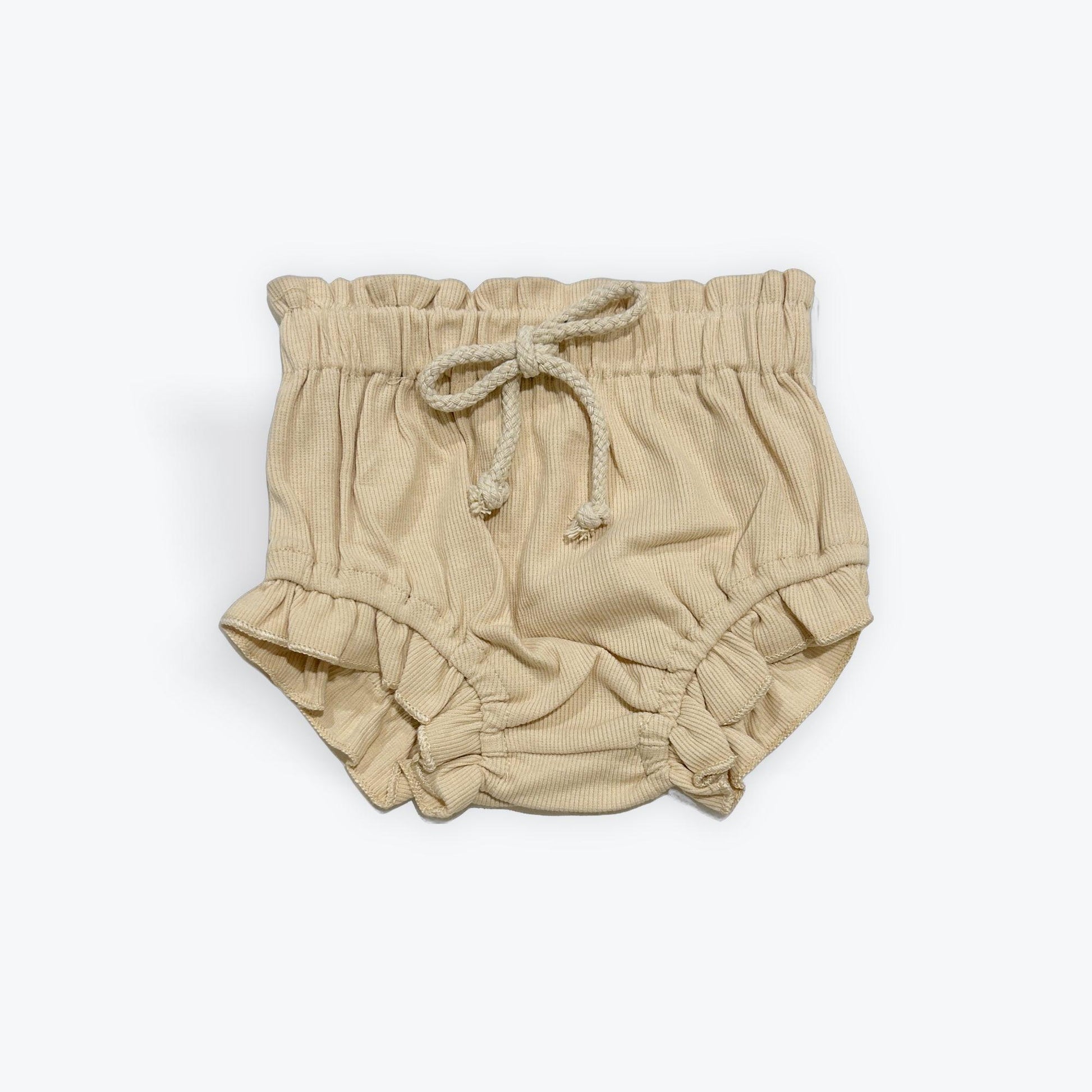 Beige organic cotton baby bloomer with elastic waist and tie, certified organic baby clothing.