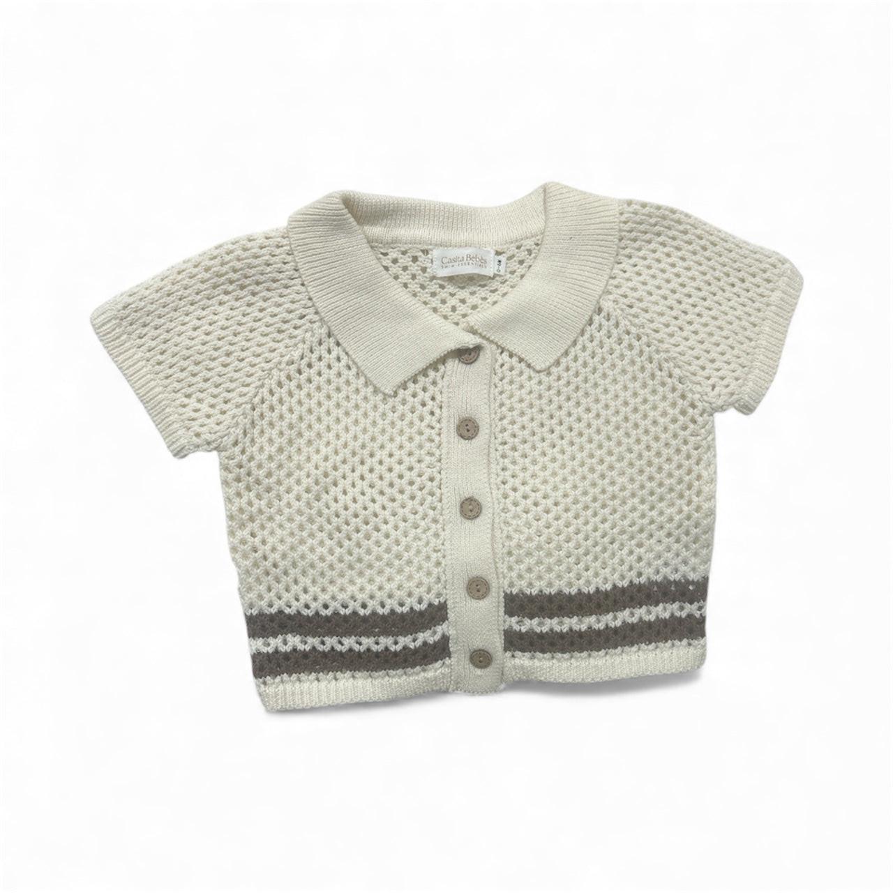 Organic cotton baby top with short sleeves and collar, knitted with button front and gray stripes, Casita Bebes certified.