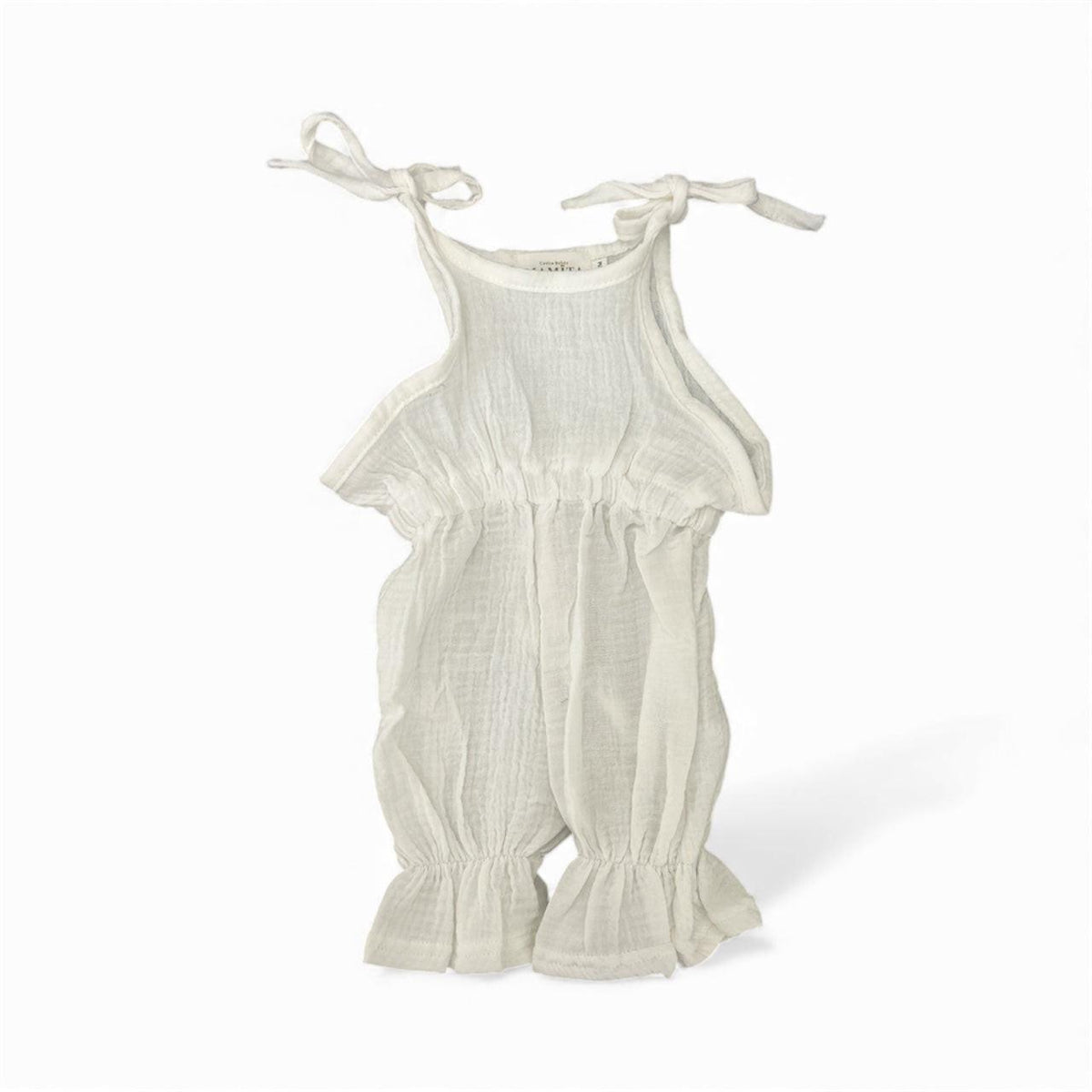 Organic cotton baby romper with tie straps and ruffled hem, soft neutral tone for newborns