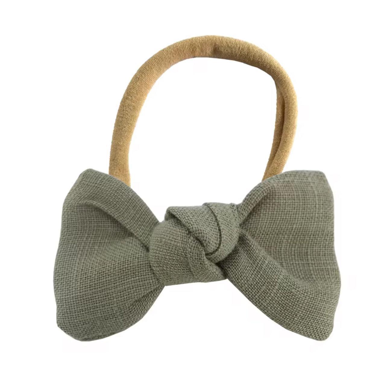 Olive green bow headband with soft fabric, perfect for baby's everyday essentials