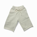 Soft organic baby pants with drawstring waist, breathable knit design for comfort