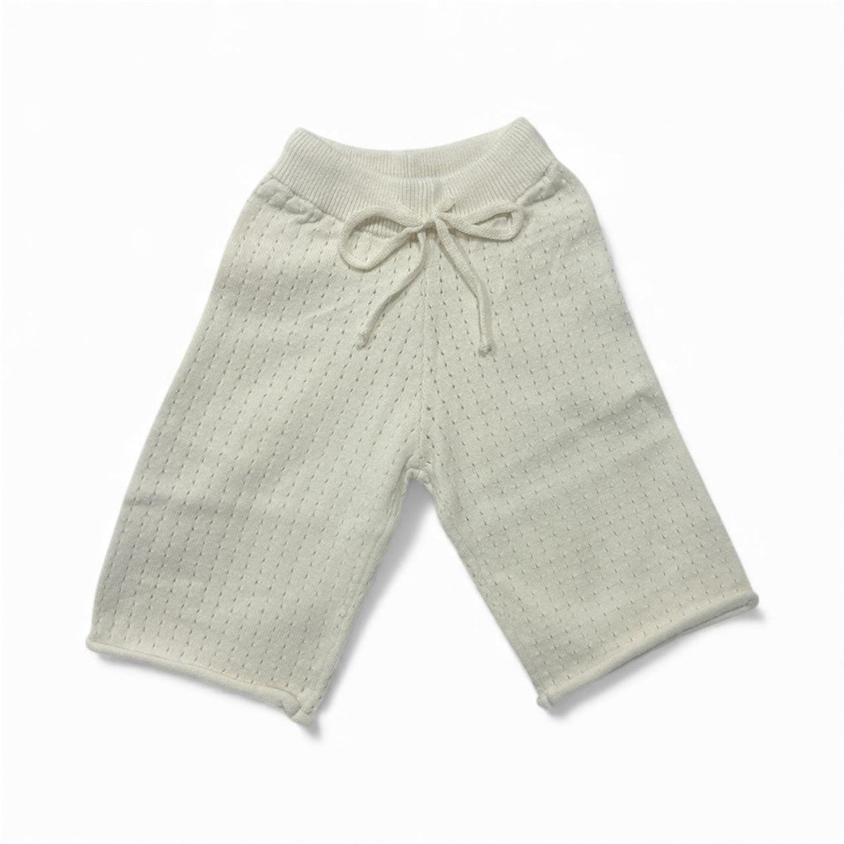 Soft organic baby pants with drawstring waist, breathable knit design for comfort