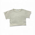 Soft organic baby tee with breathable dot knit, gentle for newborns and everyday wear