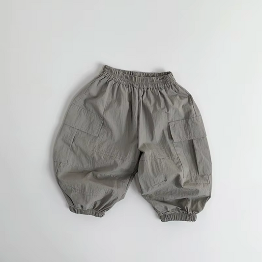 Organic dusty khaki baby pants with elastic waist and cuffs from Casita Bebes.