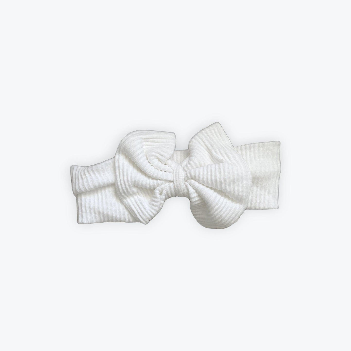White ribbed cotton bow headband for baby, certified organic, Casita Bebes baby clothing.