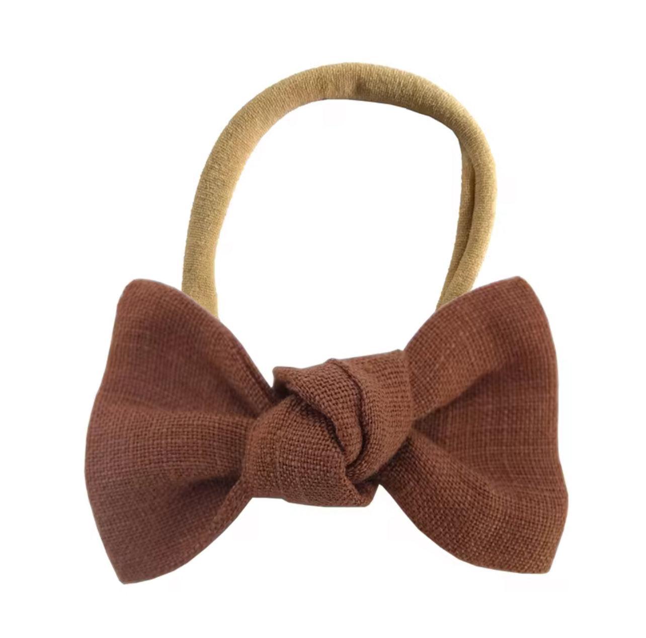 Brown bow headband for babies, soft organic fabric, gentle everyday essential