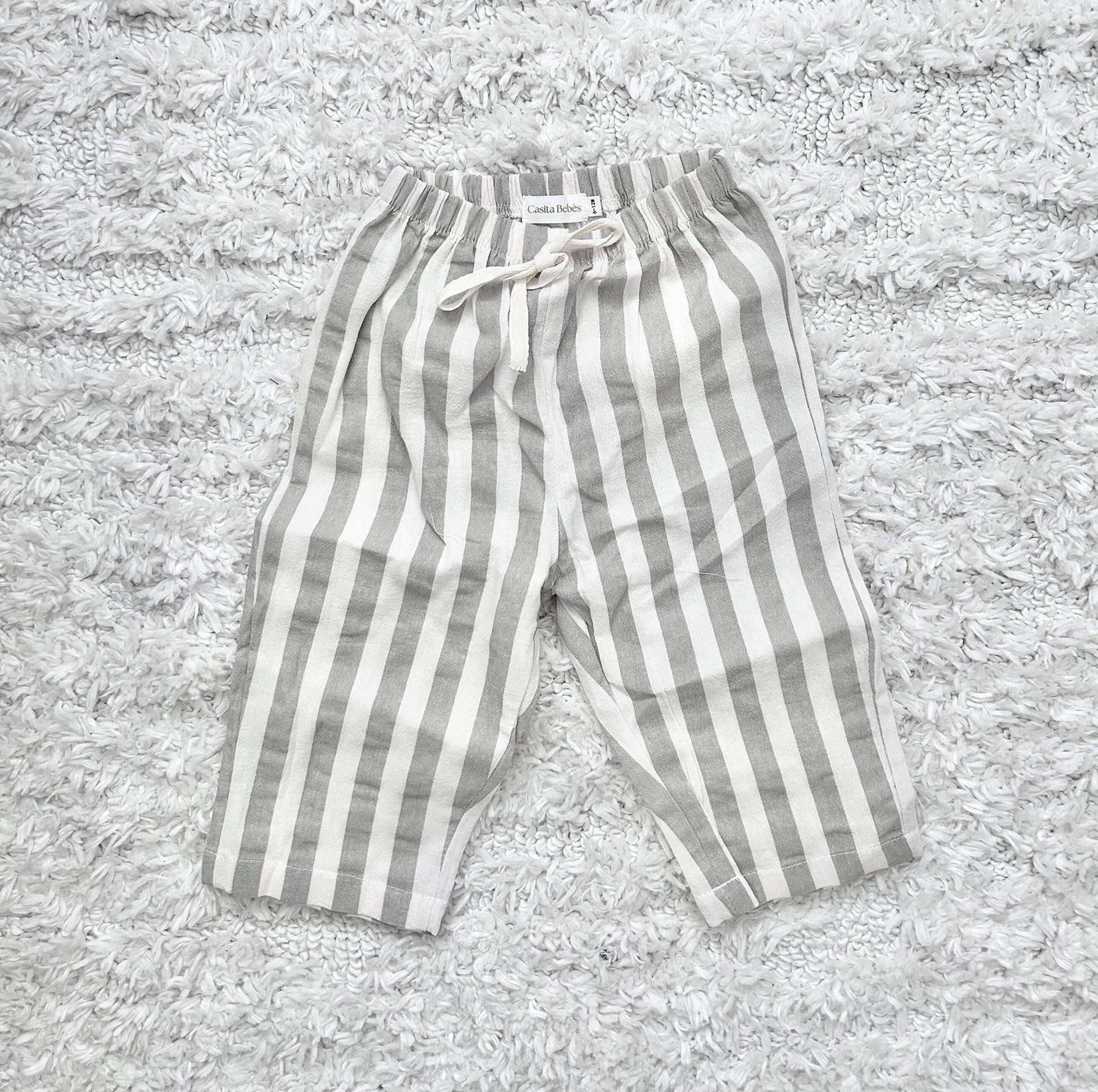 Organic dusty grey and white striped baby pants with drawstring, certified organic baby clothing by Casita Bebes.