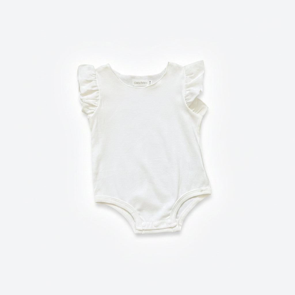 White baby bodysuit with ruffled sleeves on a light gray background
